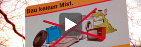 Videoausschnitt mit Play-Button: Tafel "Bau keinen Mist!"
