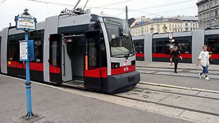 copyright: wienweb - J. Kacetl Modern "ULF"-tram at a station