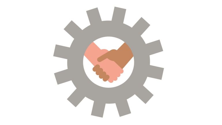 copyright: Stadt Wien Zahnrad und in der Mitte zwei Hände, die sich schütteln.