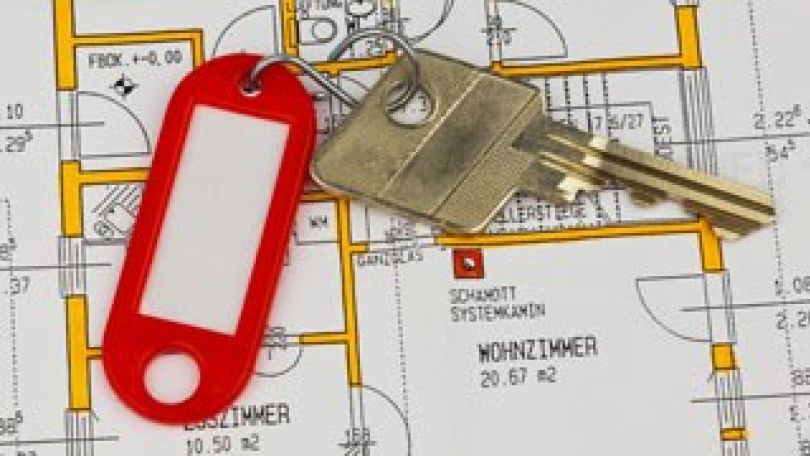 copyright: BilderBox.com Ein Wohnungsschlüssel liegt auf einem Grundriss