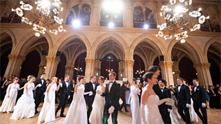 People dancing at a ball in Vienna City Hall
