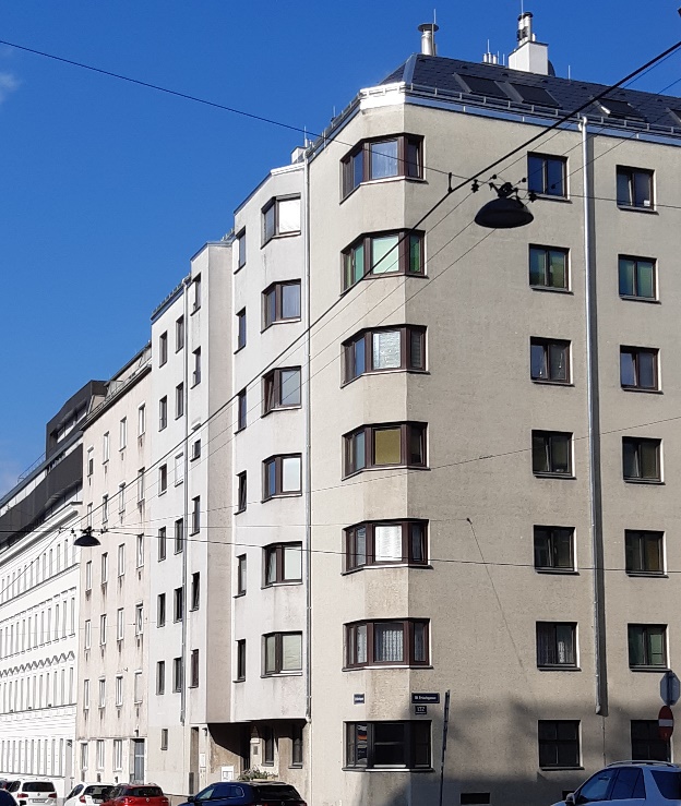 ÖSW property Neilreichgasse 9

Modern multi-apartment building at a street corner, with a white façade and brown window frames, with adjoining residential buildings in the background 