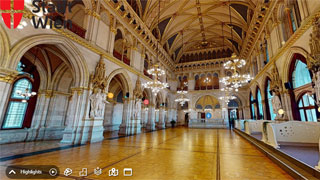 Screenshot des historischen Festsaals im Wiener Rathaus mit bunten Symbolen in der Mitte und einer Navigationsleiste unten